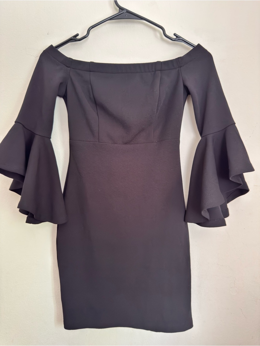 Off-Shoulder Black Dress with Dramatic Bell Sleeves